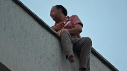 Karısına kızıp çatıya çıktı, itfaiye erlerine köşe kapmaca oynattı