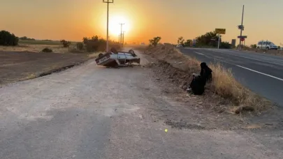 Kazazede  kadın aracın başında oturup Kuran’ı Kerim okudu.