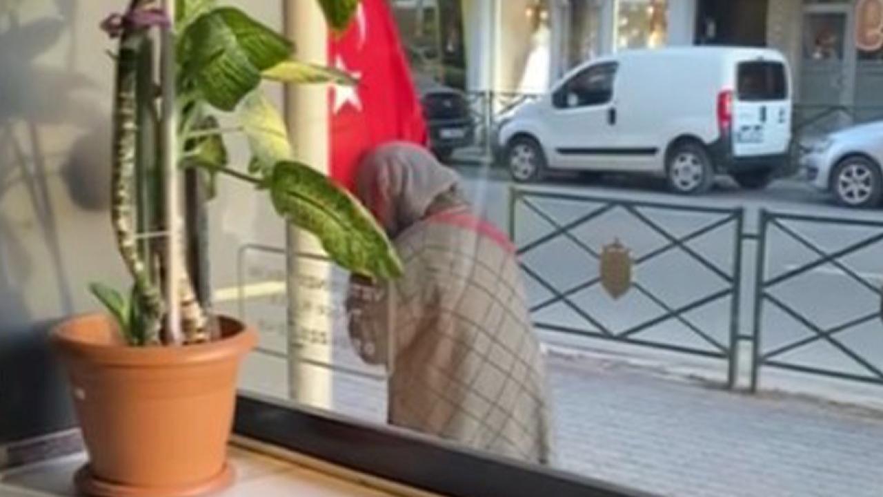 Türk bayrağını öpen teyzenin görüntüsü yürekleri ısıttı